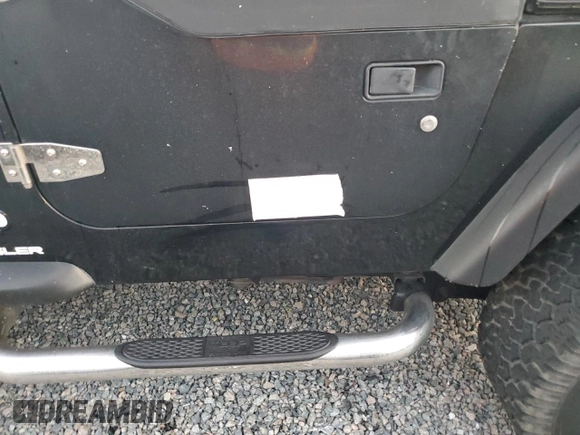 2003 Jeep Wrangler X with VIN 1J4FA39S73P340698, listed as a Copart auction lot 73888624 with 49,677 mi miles and Salvage Title. Bid and sale history available at carsss.com. Image 13.