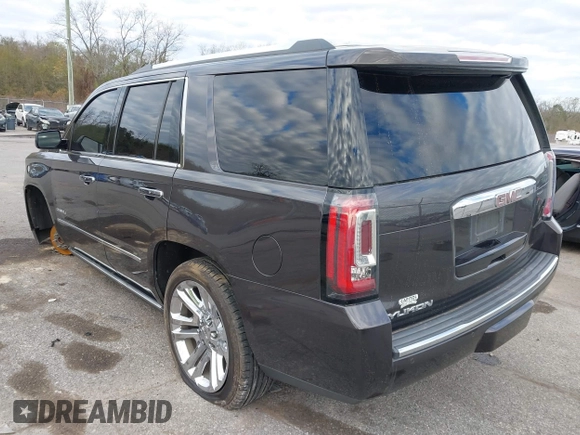 2017 GMC Yukon Denali with VIN 1GKS1CKJ0HR153941, listed as a IAAI auction lot 41300648 with 128,193 mi miles. Bid and sale history available at carsss.com. Image 3.