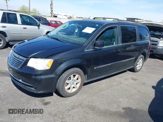 2011 Chrysler Town & Country Touring with VIN 2A4RR5DG2BR702731, listed as a IAAI auction lot 42095661 with 202,968 mi miles and . Bid and sale history available at DreamBid. Image 2.