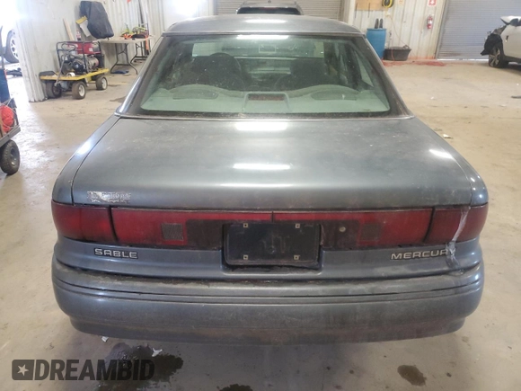 1994 Mercury Sable GS z VIN 1MELM50U0RA631872, wystawiony jako Copart lot #45880115 z przebiegiem 346 803 mil mil oraz Szkody całkowita. Historia ofert i sprzedaży dostępna na DreamBid. Obrazek 6.