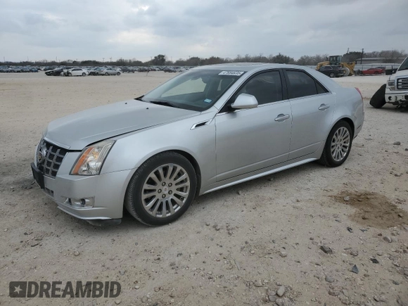 2012 Cadillac CTS Premium with VIN 1G6DP5E31C0120507, listed as a Copart auction lot 47694635 with 104,422 mi miles and Salvage title. Bid and sale history available at DreamBid. Image 1.