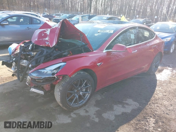 2018 Tesla Model 3 Long Range Battery with VIN 5YJ3E1EB4JF065581, listed as a IAAI auction lot 41542190 with 4,154 mi miles and . Bid and sale history available at DreamBid. Image 2.