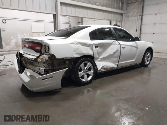 2013 Dodge Charger SE with VIN 2C3CDXBG0DH537056, listed as a IAAI auction lot 42047266 with 132,412 mi miles and . Bid and sale history available at DreamBid. Image 4.