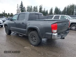 2017 Toyota Tacoma SR5 with VIN 3TMAZ5CN5HM038170, listed as a IAAI auction lot 41588399 with 152,469 mi miles. Bid and sale history available at carsss.com. Image 3.