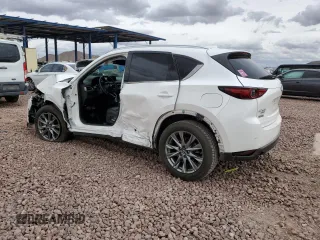 2019 Mazda CX-5 Signature with VIN JM3KFBEY3K0594305, listed as a Copart auction lot 49009235 with 73,993 mi miles and Salvage Title. Bid and sale history available at carsss.com. Image 2.