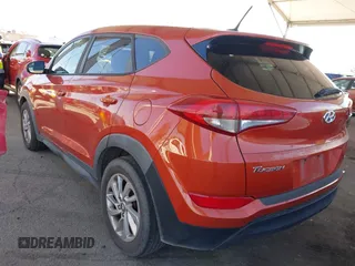 2017 Hyundai Tucson SE with VIN KM8J23A48HU357394, listed as a IAAI auction lot 41841968 with 74,769 mi miles. Bid and sale history available at carsss.com. Image 3.