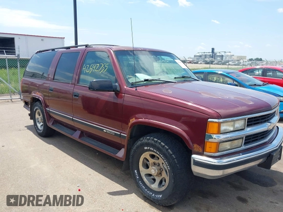 1999 Chevrolet Suburban with VIN 1GBFK16R5XJ335005, listed as a IAAI auction lot 42542755 with 200,599 mi miles and . Bid and sale history available at DreamBid. Image 1.