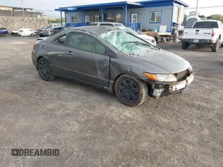 2009 Honda Civic Cpe LX with VIN 2HGFG12649H525893, listed as a IAAI auction lot 41562520 with 265,157 mi miles. Bid and sale history available at carsss.com. Image 1.
