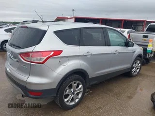 2013 Ford Escape SEL with VIN 1FMCU0H99DUC72013, listed as a IAAI auction lot 41952599 with 177,081 mi miles. Bid and sale history available at carsss.com. Image 4.