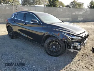 2017 Infiniti QX30 Premium with VIN SJKCH5CP2HA021527, listed as a Copart auction lot 85022454 with 86,799 mi miles and Salvage Title. Bid and sale history available at DreamBid. Image 4.