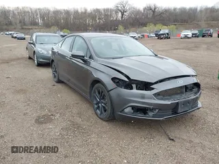 2018 Ford Fusion SE z VIN 3FA6P0HD2JR170395, wystawiony jako IAAI lot #42068792 z przebiegiem 170 940 mil mil oraz . Historia ofert i sprzedaży dostępna na DreamBid. Obrazek 1.