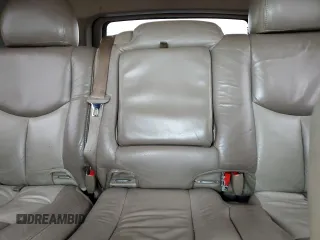 2003 GMC Yukon Denali z VIN 1GKEK63U43J263449, wystawiony jako Copart lot #53848345 z przebiegiem 144 280 mil mil oraz Szkody całkowita. Historia ofert i sprzedaży dostępna na DreamBid. Obrazek 10.