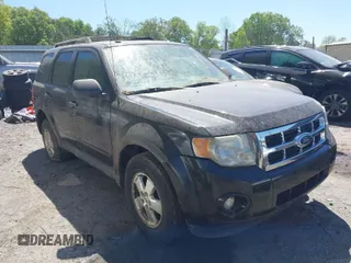 2011 Ford Escape XLT with VIN 1FMCU0D7XBKA54899, listed as a IAAI auction lot 42035816 with 180,770 mi miles. Bid and sale history available at carsss.com. Image 1.