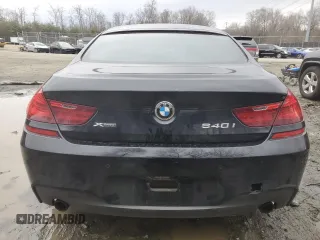 2015 BMW 6 Series 640i xDrive z VIN WBA6B8C5XFD453762, wystawiony jako Copart lot #44228965 z przebiegiem 105 188 mil mil oraz Szkoda całkowita • Salvage title. Historia ofert i sprzedaży dostępna na DreamBid. Obrazek 6.