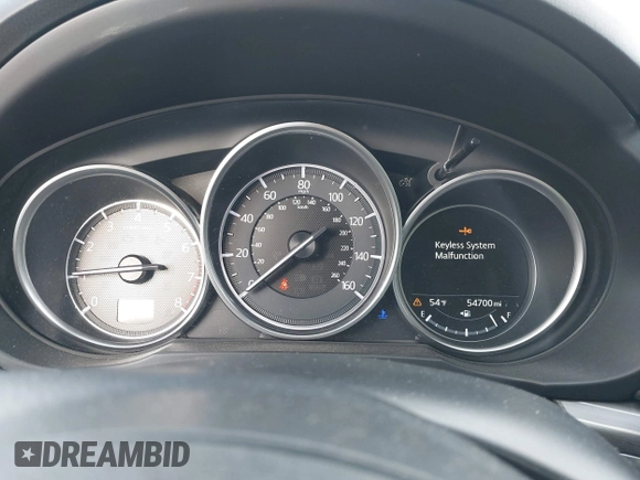 2018 Mazda CX-5 Grand Touring with VIN JM3KFADMXJ0470846, listed as a IAAI auction lot 41913533 with 54,700 mi miles and . Bid and sale history available at DreamBid. Image 7.