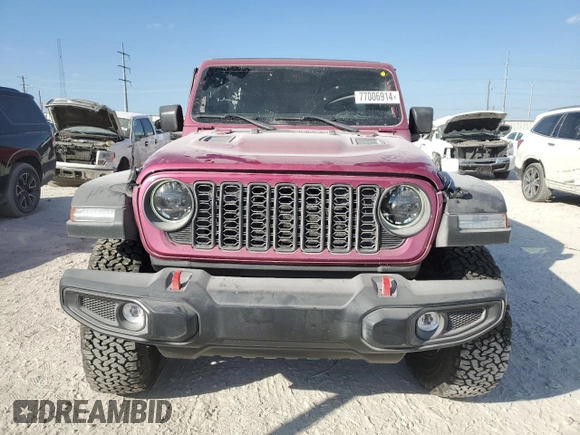 2024 Jeep Wrangler Rubicon with VIN 1C4PJXFG9RW346079, listed as a Copart auction lot 77006914 with 2,446 mi miles and Salvage Title. Bid and sale history available at DreamBid. Image 5.