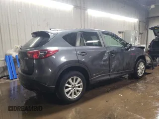 2014 Mazda CX-5 Sport z VIN JM3KE4BE2E0371864, wystawiony jako Copart lot #47225335 z przebiegiem 157 483 mil mil oraz Szkoda całkowita • Salvage title. Historia ofert i sprzedaży dostępna na DreamBid. Obrazek 3.