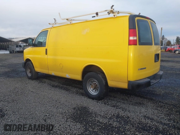 2014 Chevrolet Express Cargo Van with VIN 1GCWGFCA7E1150041, listed as a IAAI auction lot 41387426 with 185,480 mi miles. Bid and sale history available at carsss.com. Image 3.