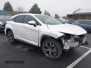 2021 Lexus RX with VIN 2T2HZMAA6MC188358, listed as a IAAI auction lot 38122169 with 42,757 mi miles. Bid and sale history available at carsss.com. Image 1.