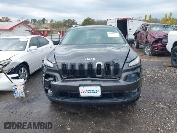 2014 Jeep Cherokee Altitude with VIN 1C4PJMCB7EW232678, listed as a IAAI auction lot 40812147 with 105,828 mi miles. Bid and sale history available at carsss.com. Image 13.