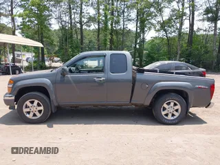 2012 GMC Canyon SLE2 z VIN 1GTJ6PFE2C8128602, wystawiony jako IAAI lot #42421110 z przebiegiem 79 273 mil mil oraz . Historia ofert i sprzedaży dostępna na DreamBid. Obrazek 14.