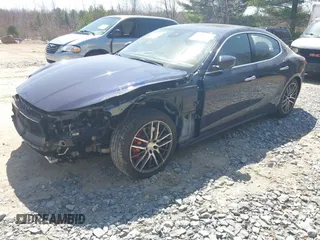 2019 Maserati Ghibli S Q4 GranLusso z VIN ZAM57YTLXK1338200, wystawiony jako IAAI lot #41875692 z przebiegiem 31 254 mil mil oraz . Historia ofert i sprzedaży dostępna na DreamBid. Obrazek 2.