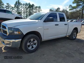 2014 Ram 1500 Tradesman with VIN 1C6RR6FG2ES301831, listed as a IAAI auction lot 41337444 with 187,065 mi miles and . Bid and sale history available at DreamBid. Image 2.