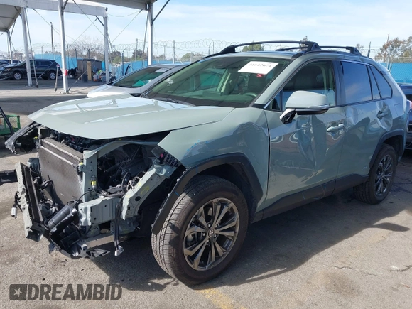 2023 Toyota RAV4 Hybrid XLE Premium with VIN JTMB6RFV8PD086983, listed as a IAAI auction lot 41612674 with 70,817 mi miles. Bid and sale history available at carsss.com. Image 2.