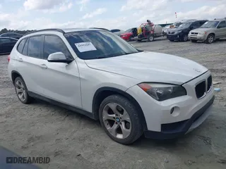 2013 BMW X1 28i with VIN WBAVM1C59DVW44965, listed as a IAAI auction lot 41951047 with 122,191 mi miles. Bid and sale history available at carsss.com. Image 1.
