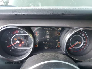2021 Jeep Gladiator Rubicon with VIN 1C6JJTBM1ML599103, listed as a Copart auction lot 77084134 with 16,031 mi miles and Salvage title. Bid and sale history available at DreamBid. Image 9.