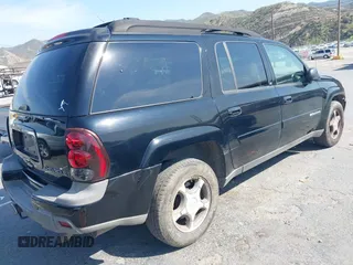 2004 Chevrolet TrailBlazer EXT LT with VIN 1GNES16S846192292, listed as a IAAI auction lot 41958602 with 125,525 mi miles. Bid and sale history available at carsss.com. Image 4.