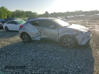 2019 Toyota C-HR XLE z VIN JTNKHMBX3K1050175, wystawiony jako Copart lot #52364415 z przebiegiem 69 811 mil mil oraz Szkoda całkowita • Salvage title. Historia ofert i sprzedaży dostępna na DreamBid. Obrazek 12.