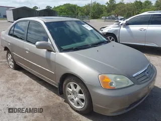 2001 Honda Civic EX with VIN 2HGES26711H599408, listed as a IAAI auction lot 41993846 with 96,095 mi miles and . Bid and sale history available at DreamBid. Image 1.