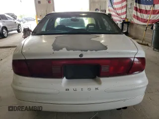 1998 Buick Regal LS with VIN 2G4WB52K5W1415761, listed as a Copart auction lot 55811595 with 102,133 mi miles and Salvage title. Bid and sale history available at DreamBid. Image 6.