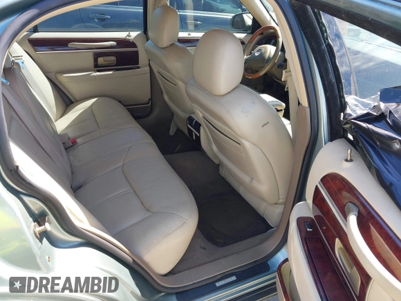 2004 Lincoln Town Car Ultimate z VIN 1LNHM83W74Y688961, wystawiony jako IAAI lot #42222464 z przebiegiem 132 780 mil mil oraz . Historia ofert i sprzedaży dostępna na DreamBid. Obrazek 8.