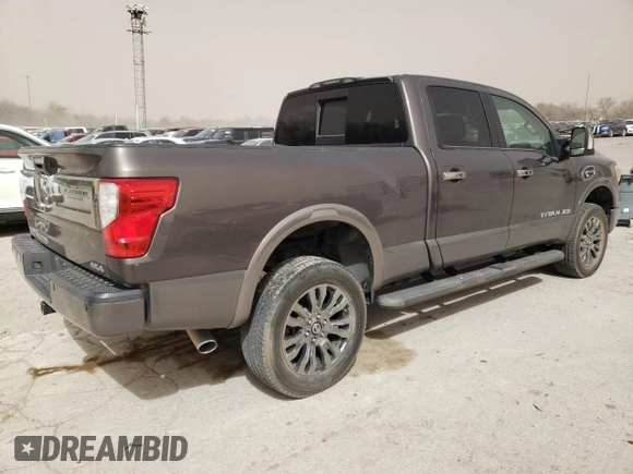 2016 Nissan Titan Pro-4X z VIN 1N6BA1F4XGN502773, wystawiony jako Copart lot #49285535 z przebiegiem 129 390 mil mil oraz Czysty tytuł • Clean title. Historia ofert i sprzedaży dostępna na DreamBid. Obrazek 3.
