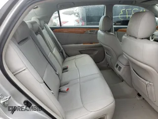 2005 Toyota Avalon XL z VIN 4T1BK36B95U044040, wystawiony jako Copart lot #59369691 z przebiegiem 111 373 mil mil oraz Szkoda całkowita • Salvage title. Historia ofert i sprzedaży dostępna na DreamBid. Obrazek 6.