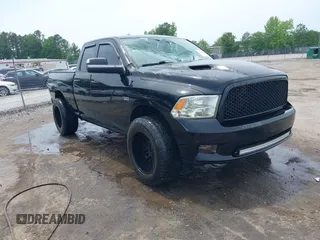 2012 Ram 1500 Sport z VIN 1C6RD7HT1CS300133, wystawiony jako IAAI lot #42248688 z przebiegiem 160 675 mil mil oraz . Historia ofert i sprzedaży dostępna na DreamBid. Obrazek 1.