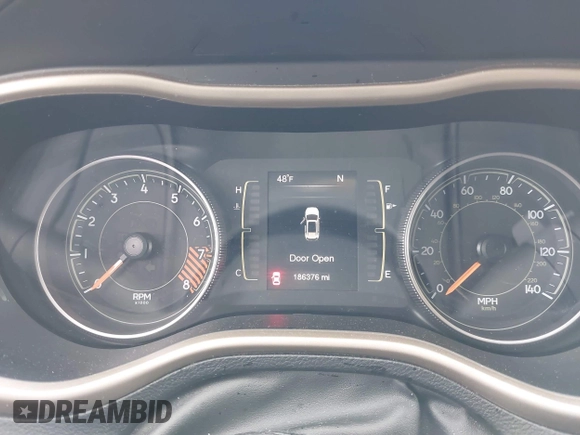 2015 Jeep Cherokee North with VIN 1C4PJMCS9FW674475, listed as a IAAI auction lot 41971771 with 186,376 mi miles. Bid and sale history available at carsss.com. Image 14.
