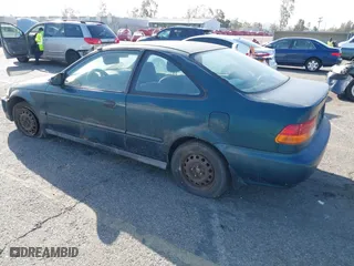 1997 Honda Civic DX with VIN 1HGEJ622XVL073128, listed as a IAAI auction lot 41721903 with 177,616 mi miles. Bid and sale history available at carsss.com. Image 3.