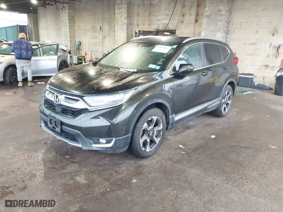 2018 Honda CR-V Touring with VIN 2HKRW2H96JH604497, listed as a IAAI auction lot 41007064 with 38,566 mi miles. Bid and sale history available at carsss.com. Image 17.
