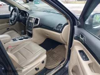 2011 Jeep Grand Cherokee Limited with VIN 1J4RR5GT4BC636541, listed as a IAAI auction lot 41912877 with 127,482 mi miles. Bid and sale history available at carsss.com. Image 5.