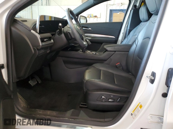 2024 Cadillac XT4 AWD Premium Luxury z VIN 1GYFZDR49RF100387, wystawiony jako Copart lot #76304794 z przebiegiem 14 649 mil mil oraz Szkoda całkowita • Salvage title. Historia ofert i sprzedaży dostępna na DreamBid. Obrazek 7.