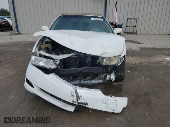 2002 Toyota Solara SE z VIN 2T1FF28P32C590841, wystawiony jako Copart lot #43753475 z przebiegiem 128 106 mil mil oraz Szkoda całkowita • Salvage title. Historia ofert i sprzedaży dostępna na DreamBid. Obrazek 5.