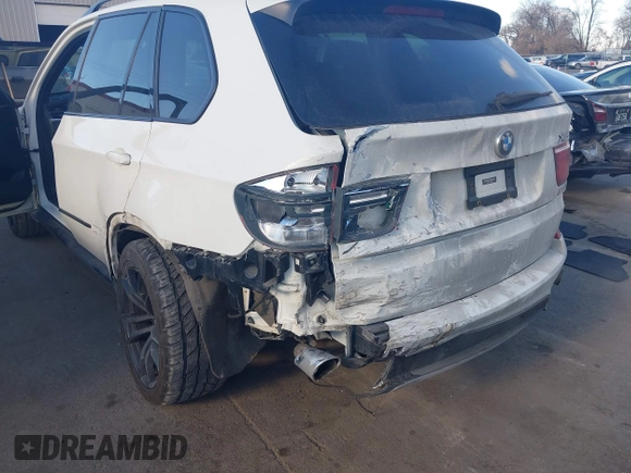 2012 BMW X5 35d with VIN 5UXZW0C56CL665631, listed as a IAAI auction lot 41055705 with 179,408 mi miles and . Bid and sale history available at DreamBid. Image 6.