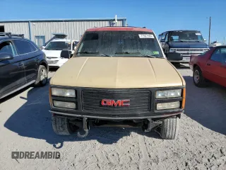 1994 GMC Suburban z VIN 1GKFK16K0RJ751324, wystawiony jako Copart lot #77827404 z przebiegiem 219 786 mil mil oraz Szkoda całkowita • Salvage title. Historia ofert i sprzedaży dostępna na DreamBid. Obrazek 5.