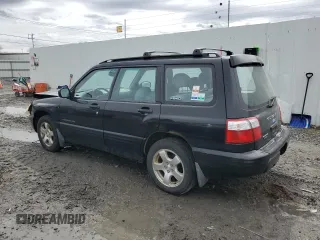 2001 Subaru Forester S w/Premium Pkg with VIN JF1SF656X1H725718, listed as a Copart auction lot 51517935 with 153,875 mi miles and Salvage Title. Bid and sale history available at carsss.com. Image 2.