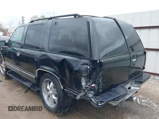 1998 GMC Yukon with VIN 1GKEC13R8WJ711255, listed as a IAAI auction lot 41457304 with 291,211 mi miles. Bid and sale history available at carsss.com. Image 6.