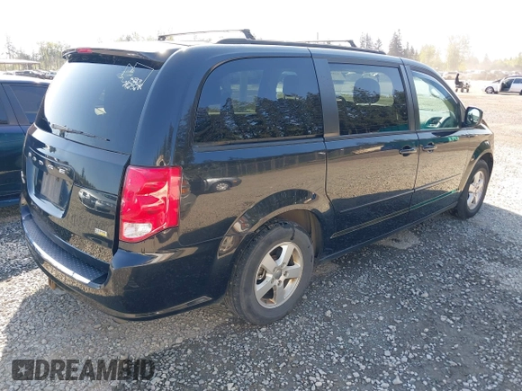 2012 Dodge Grand Caravan SXT with VIN 2C4RDGCG2CR319651, listed as a IAAI auction lot 42097594 with 155,521 mi miles and . Bid and sale history available at DreamBid. Image 4.