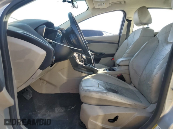 2014 Ford Focus Electric with VIN 1FADP3R45EL287285, listed as a Copart auction lot 74148154 with 64,543 mi miles and Salvage title. Bid and sale history available at DreamBid. Image 7.